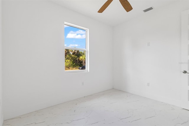 unfurnished room with ceiling fan