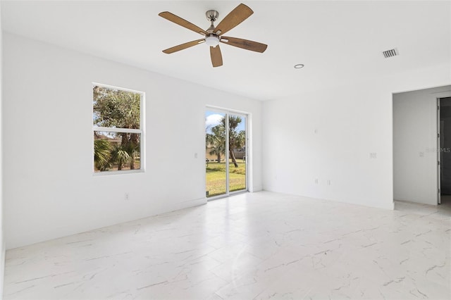 empty room featuring ceiling fan