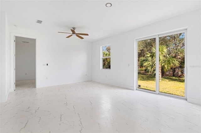 unfurnished room featuring ceiling fan