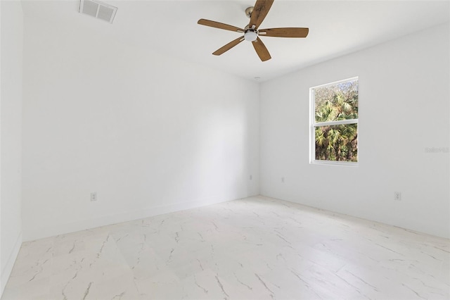 empty room featuring ceiling fan