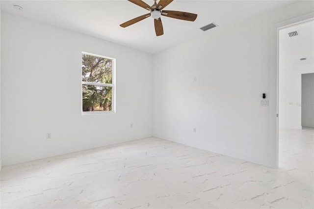 unfurnished room with ceiling fan