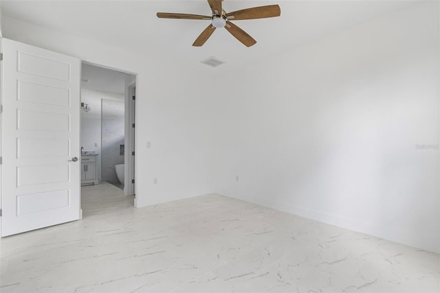 empty room featuring ceiling fan