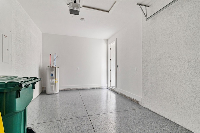 garage with electric water heater and a garage door opener