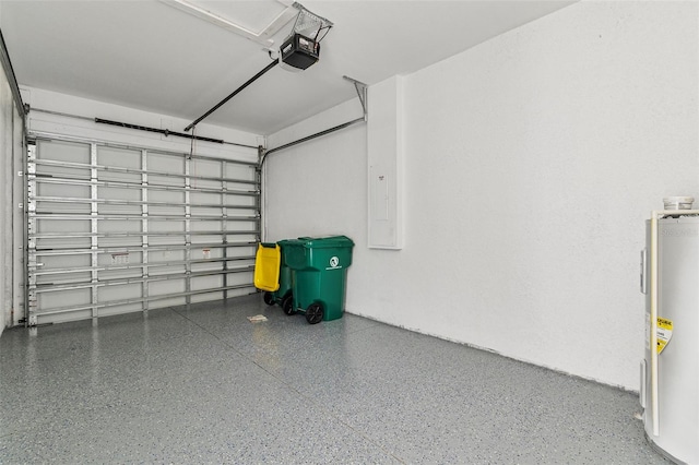 garage featuring electric water heater and a garage door opener