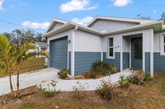 view of side of home with a garage