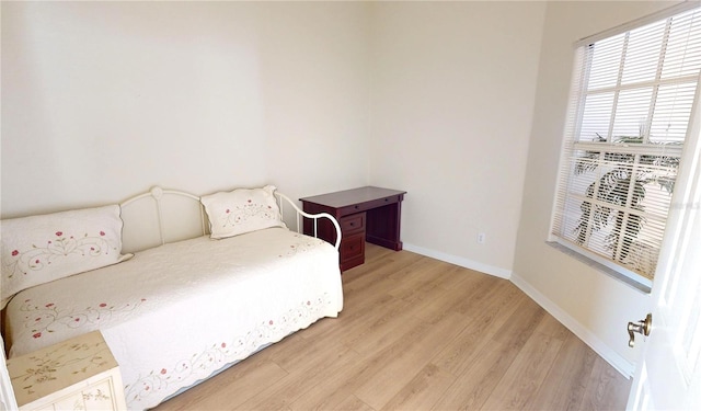 bedroom featuring light wood-type flooring