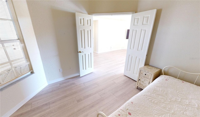 bedroom featuring light hardwood / wood-style flooring