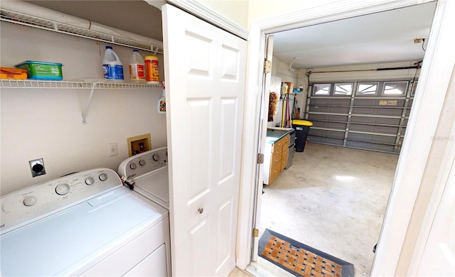 washroom with separate washer and dryer