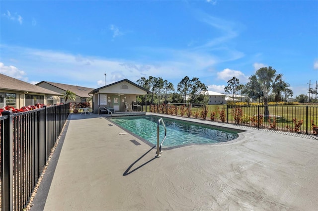 view of swimming pool featuring a patio area