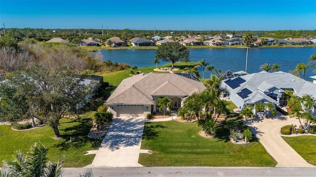 bird's eye view with a water view