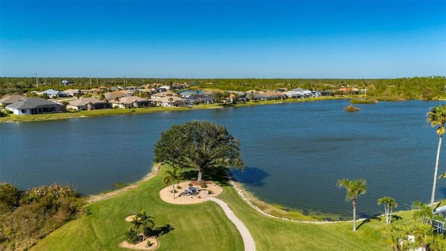 13028 SW Kingsway Cir, Lake Suzy, FL 34269 - water view featuring nearby suburban area