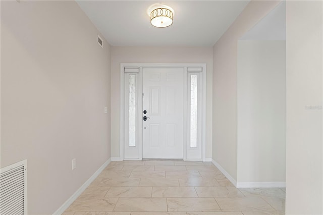 entrance foyer featuring a wealth of natural light