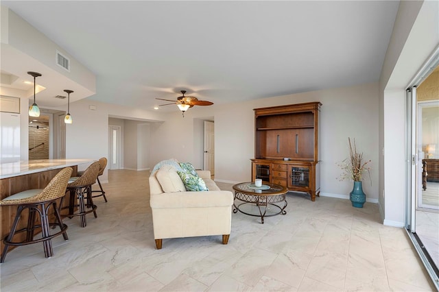 living room featuring ceiling fan