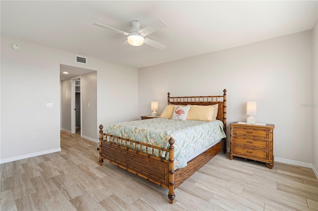 bedroom featuring ceiling fan and light wood-type flooring