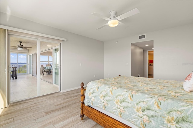 bedroom featuring ceiling fan and access to outside