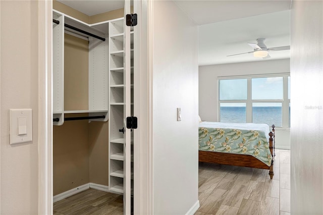 interior space featuring ceiling fan and light hardwood / wood-style flooring