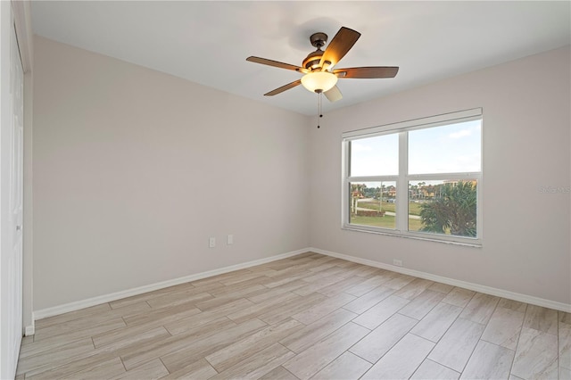 unfurnished room featuring ceiling fan and light hardwood / wood-style floors