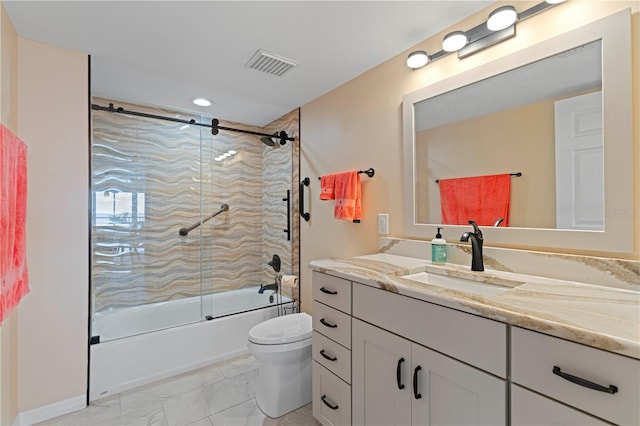 full bathroom featuring toilet, enclosed tub / shower combo, and vanity