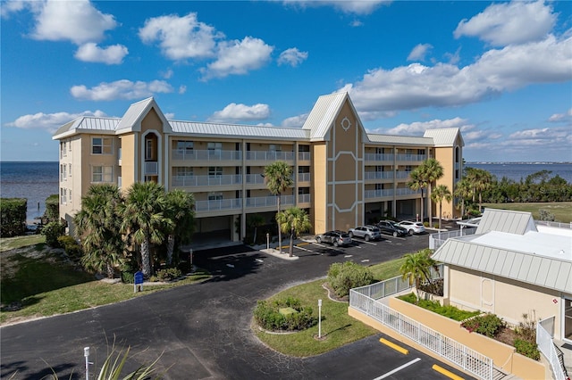 view of building exterior with a water view