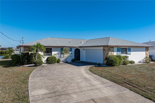 ranch-style home with a garage and a front yard