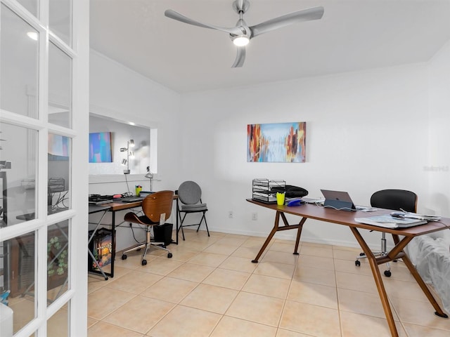 home office with ceiling fan and light tile patterned flooring