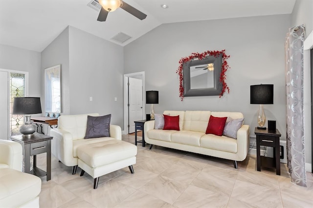 living room featuring ceiling fan and lofted ceiling