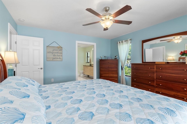 bedroom with ensuite bathroom and ceiling fan