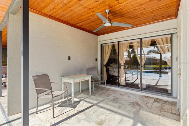 view of patio with ceiling fan