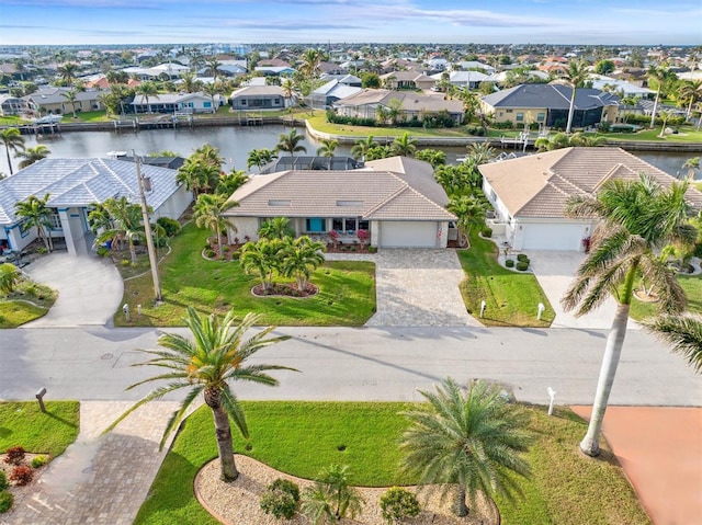 bird's eye view with a water view