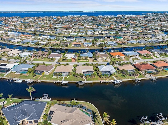 drone / aerial view with a water view