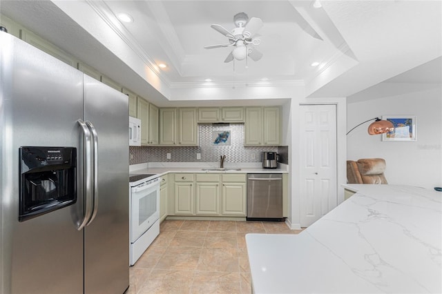 kitchen featuring stainless steel appliances, ceiling fan, backsplash, a raised ceiling, and light stone counters