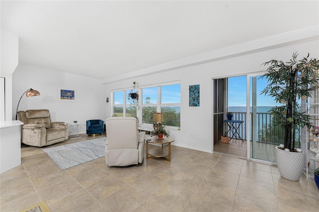 living room featuring a water view