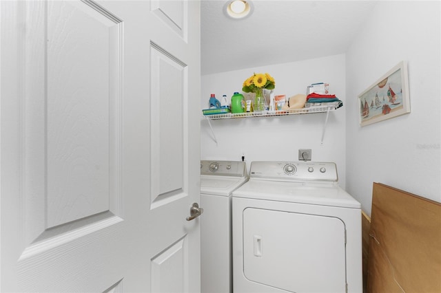 laundry area featuring independent washer and dryer