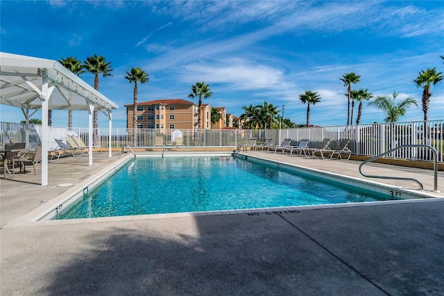 view of swimming pool featuring a patio