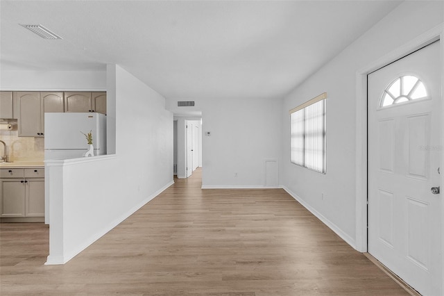 foyer featuring light hardwood / wood-style floors