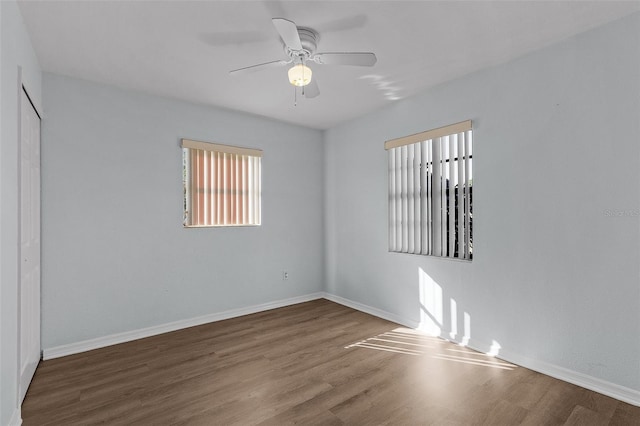 unfurnished room featuring ceiling fan and wood-type flooring