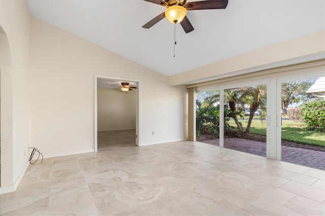 empty room with vaulted ceiling and ceiling fan