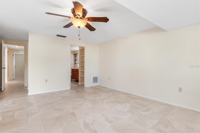 unfurnished room featuring ceiling fan