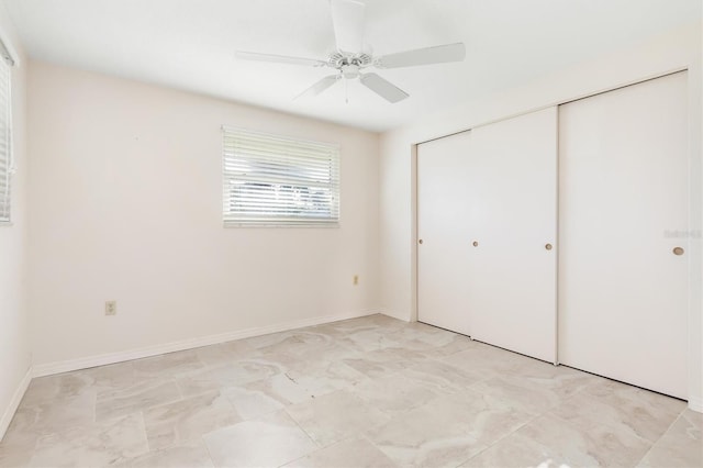 unfurnished bedroom featuring a closet and ceiling fan