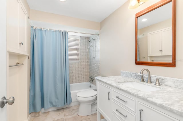 full bathroom with vanity, shower / bath combo, and toilet