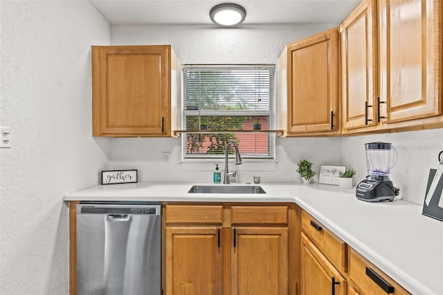 kitchen featuring dishwasher and sink