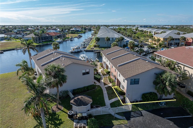 bird's eye view with a water view