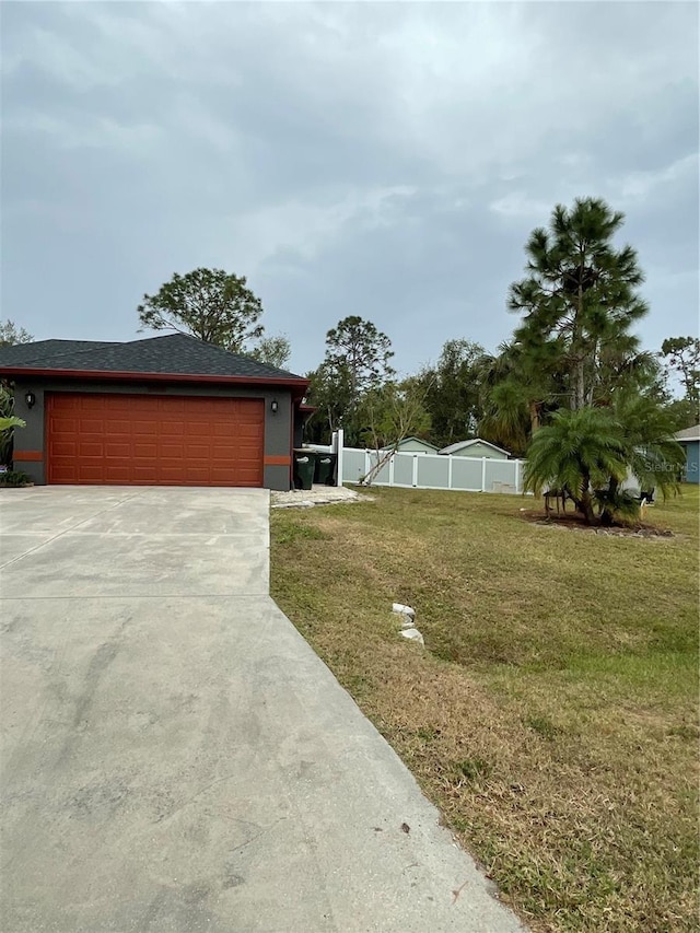 view of yard featuring a garage