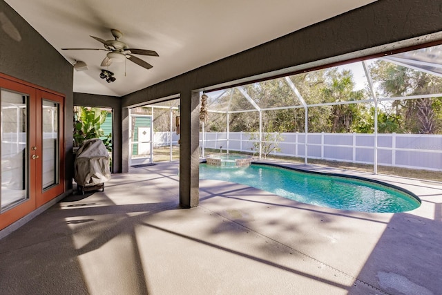 view of swimming pool featuring ceiling fan and a grill