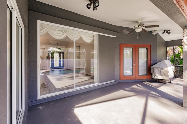 view of patio / terrace featuring french doors, ceiling fan, and a grill