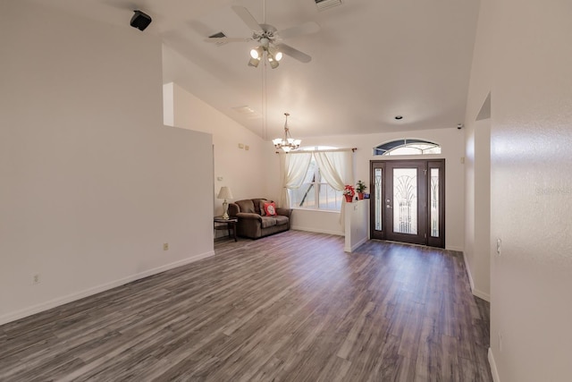 foyer featuring ceiling fan with notable chandelier, high vaulted ceiling, and dark hardwood / wood-style floors