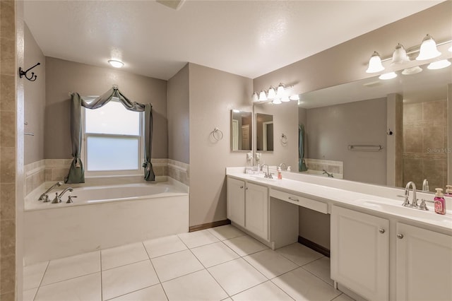 bathroom featuring vanity, a tub to relax in, and tile patterned floors