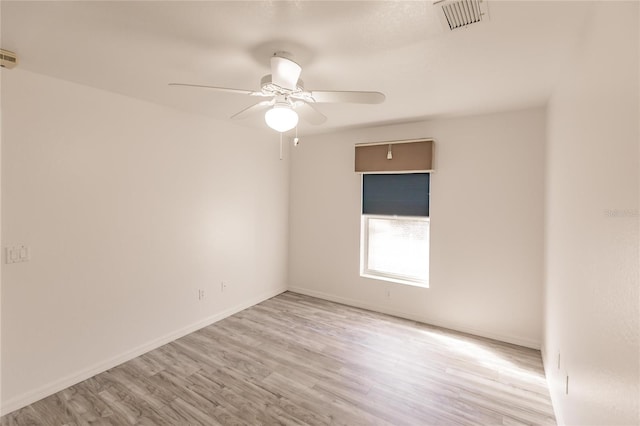 unfurnished room with light hardwood / wood-style floors and ceiling fan