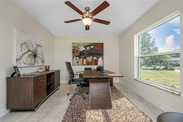 office area with ceiling fan