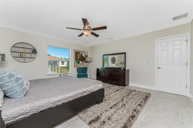 bedroom featuring ceiling fan